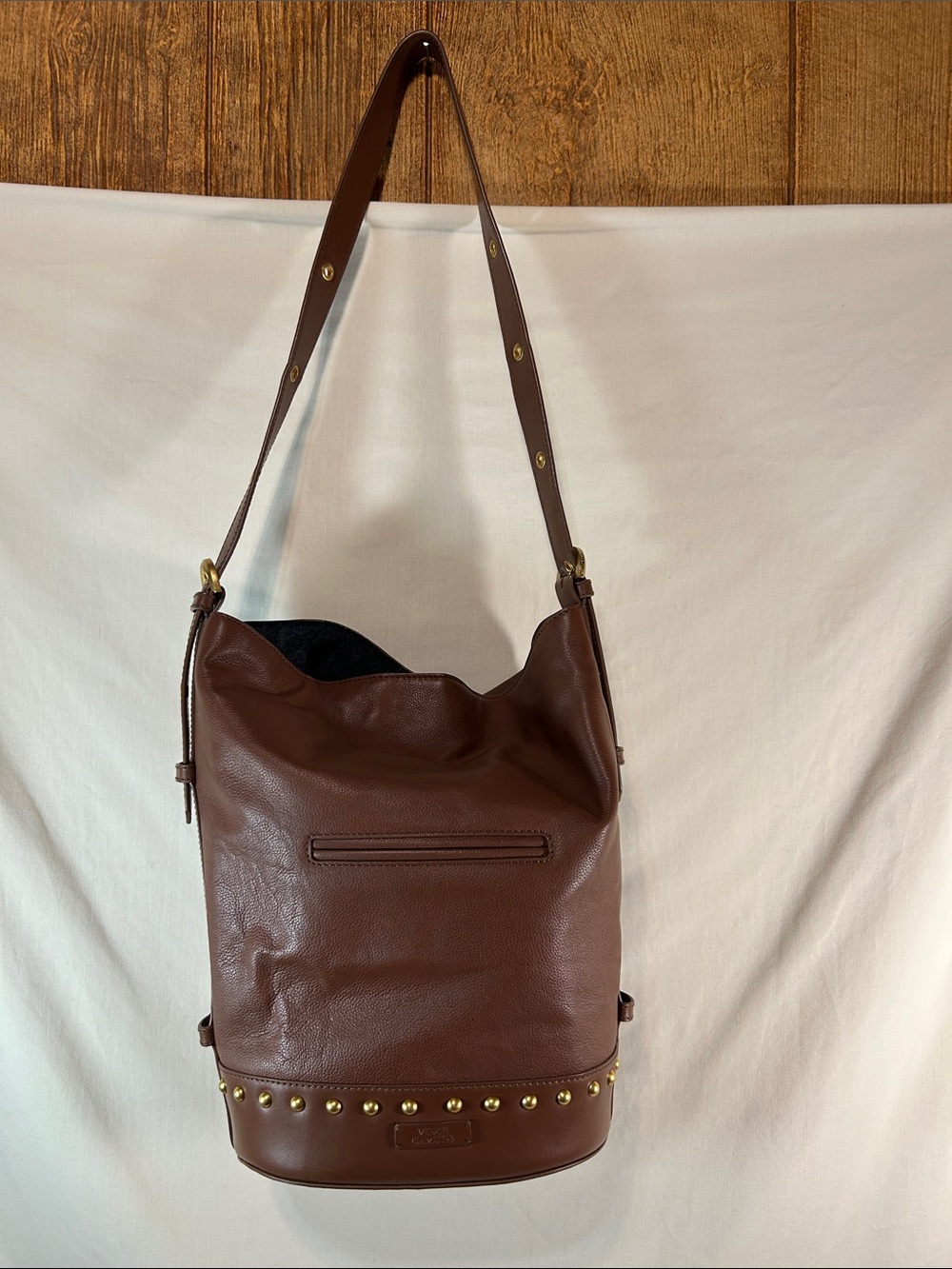 Vince Camuto Womanβs Leather Stud-Trim Bucket Bag Purse in Brown